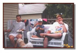 Andy (left) with brothers Mike (middle) and Rod Jr. enjoying a summer BBQ